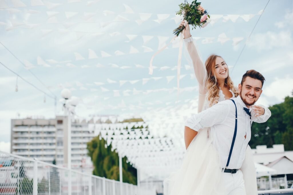 bride and groom smiling outdoor